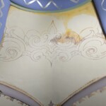 Conservation and reconstruction of the polychrome paintings by Władysław, Leon, and Kazimierz Drapiewski; work carried out as part of a team under the direction of Dr. habil. Sylwester Piędziejewski, 2025. A decorative ceiling polychrome in the process of reconstruction, partially destroyed and with a sketch of the ornament to be reconstructed
