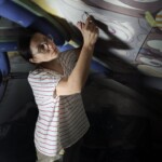 Conservation and reconstruction of the polychrome paintings by Władysław, Leon, and Kazimierz Drapiewski; work carried out as part of a team under the direction of Dr. habil. Sylwester Piędziejewski, 2025.
Photo: Katarzyna Saniuk A female painter at work on a scaffolding under a Gothic vault