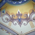 Conservation and reconstruction of the polychrome paintings by Władysław, Leon, and Kazimierz Drapiewski; work carried out as part of a team under the direction of Dr. habil. Sylwester Piędziejewski, 2025. A finished decorative ceiling polychrome in blues, yellows, ochre, and pale greens