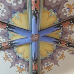 Conservation and reconstruction of the polychrome paintings by Władysław, Leon, and Kazimierz Drapiewski; work carried out as part of a team under the direction of Dr. habil. Sylwester Piędziejewski, 2025. A finished decorative ceiling polychrome in blues, yellows, ochre, brick orange, and pale greens